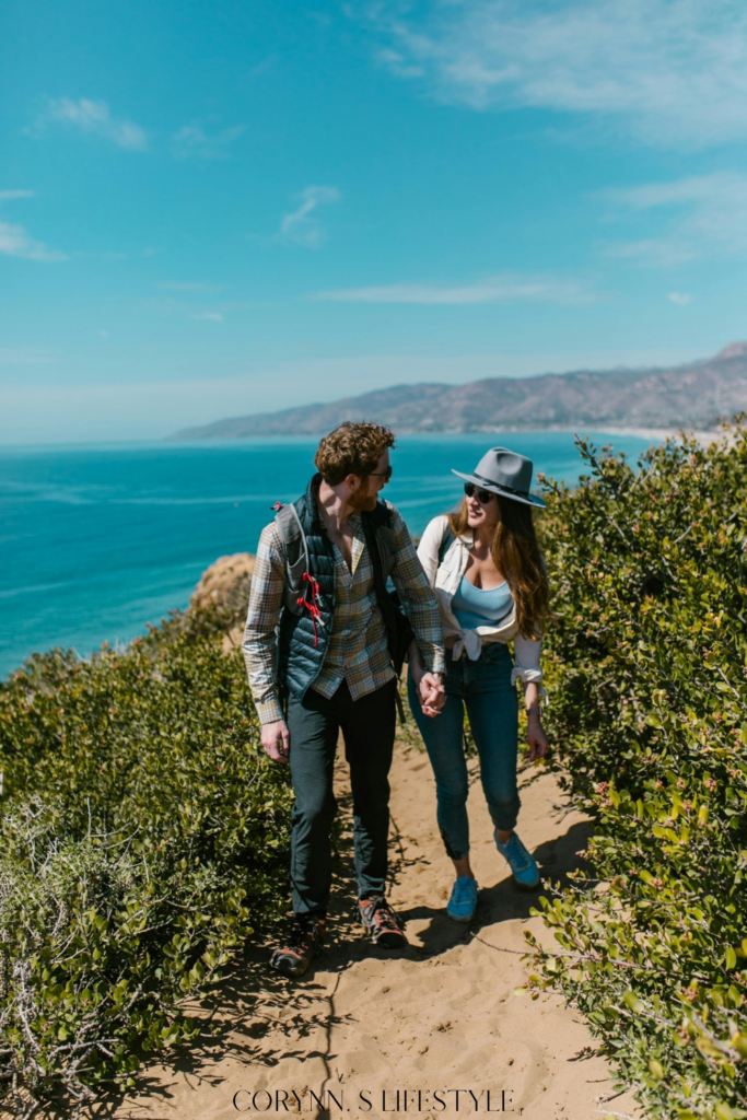 Photo of two couples hiking. Wedding registry must haves non-kitchen items.